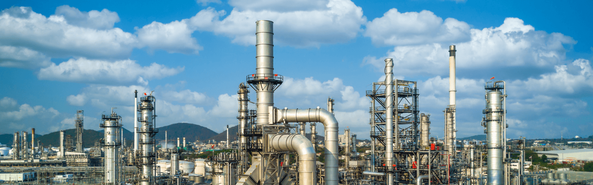 Sulphur recovery unit in a refinery process plant with piping, towers, and industrial equipment used in gas processing and analyzer applications - Novatech